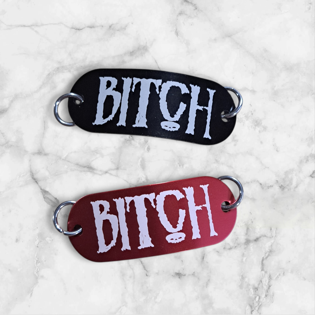 Black or red Bitch lacing tag