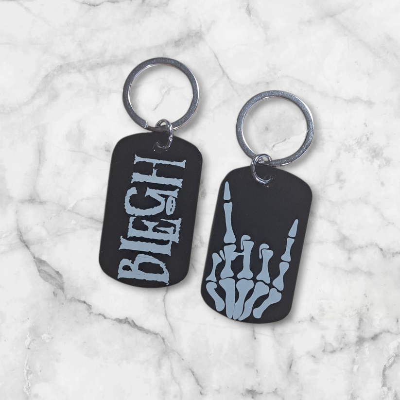 BLEGH and skeleton hand design keychain