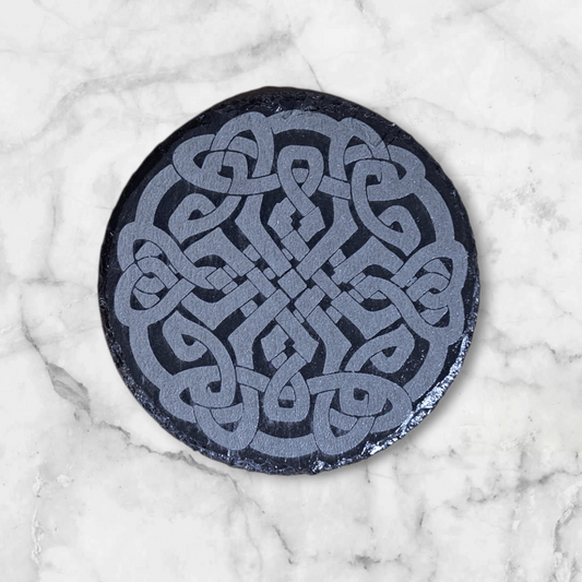 Round slate coaster with Celtic knot design 