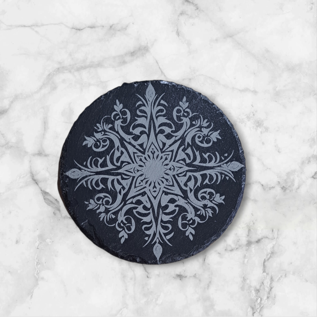 Decorative stone coaster with snowflake design 